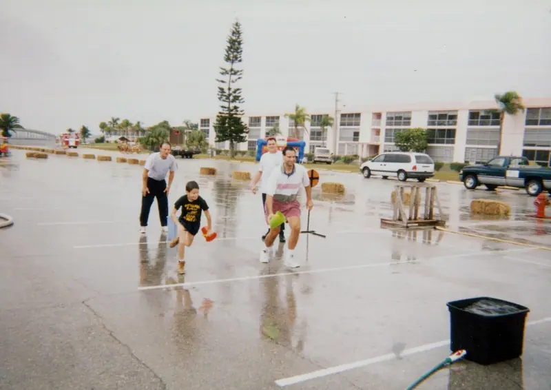 Kids playing water games at a fire truck party – Water & Wetdown Parties in Orlando, FL